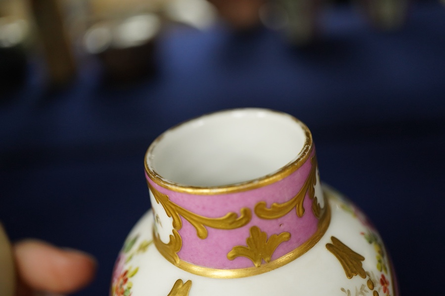 A pair of 19th century Sevres style vases and covers, marked rubbed, 15cm